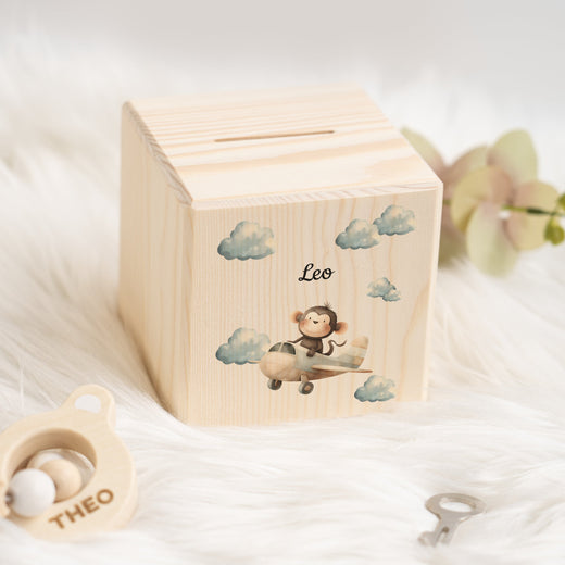Holzspardose für Kinder Safari-Motiv Affe im Flugzeug - Geschenkfreude